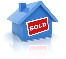 Graphic of blue house with red "SOLD" sign on the front