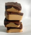 chocolate peanut butter squares in a stack