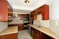 Renovated kitchen - stainless steel appliances & granite countertops!
