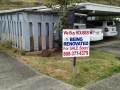 FSBO sign on front yard of Hawaii house